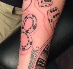 Roulette, craps, casino chips tattoo