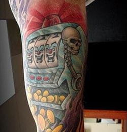 Skull slot machine tattoo