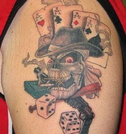 Smoking skull gambling tattoo