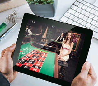 juego de ruleta en vivo en una pantalla de tableta