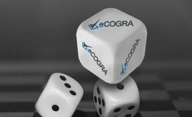 Logo of eCOGRA testing company on a dice