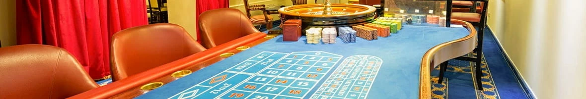 Various roulette imagery: table, wheel and props
