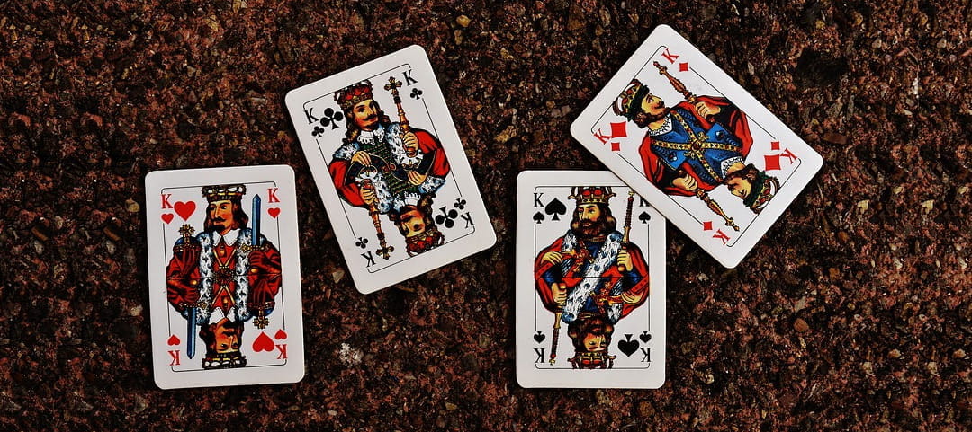 All Four Kings in a Card Deck
