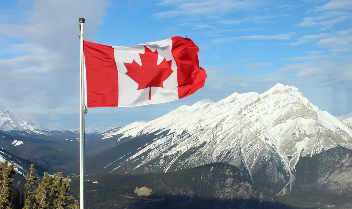 Canadian flag waving in the wind