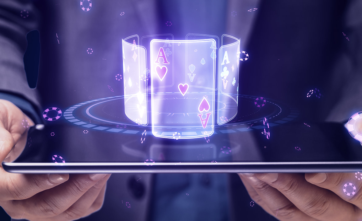 Hands Holding Tablet with Playing Cards