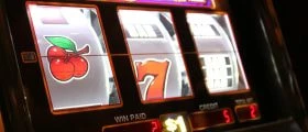 A slot showing fruit machine style symbols