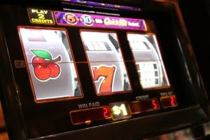 A slot showing fruit machine style symbols