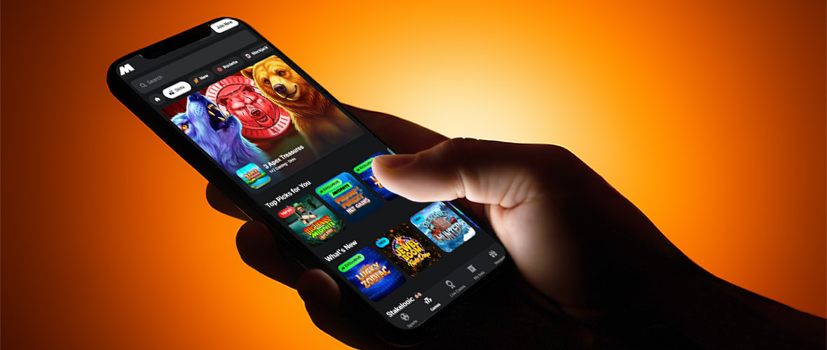 The Midnite lobby viewed on iPhone 15 — note the search bar placement and the casino/sports toggle.