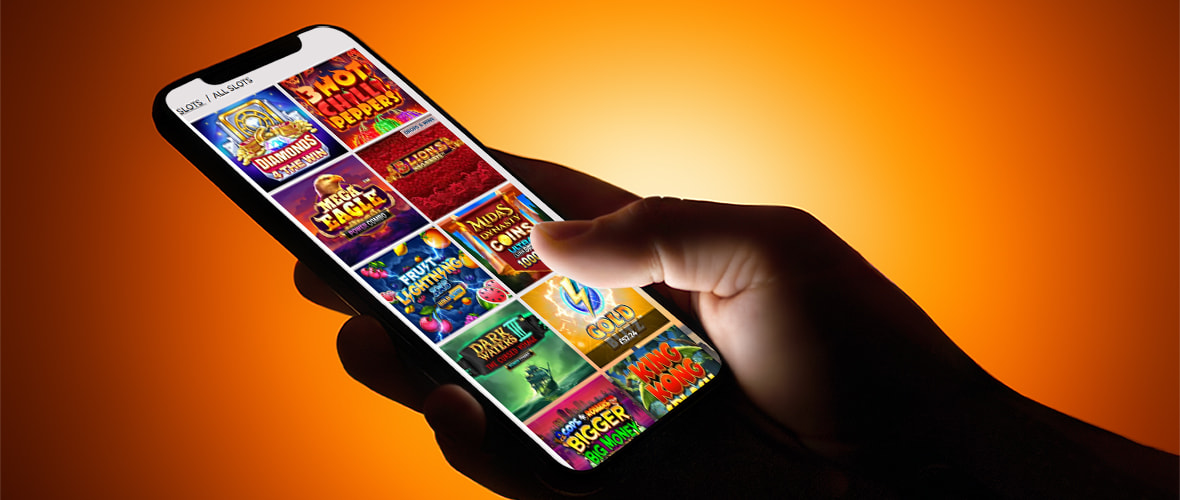 The NYspins lobby viewed on iPhone 15 — note the search bar placement and the New York Marketplace entry point.