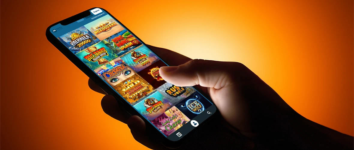 The Yeti Casino lobby viewed on iPhone 15 — note the search bar placement and the provider filter.