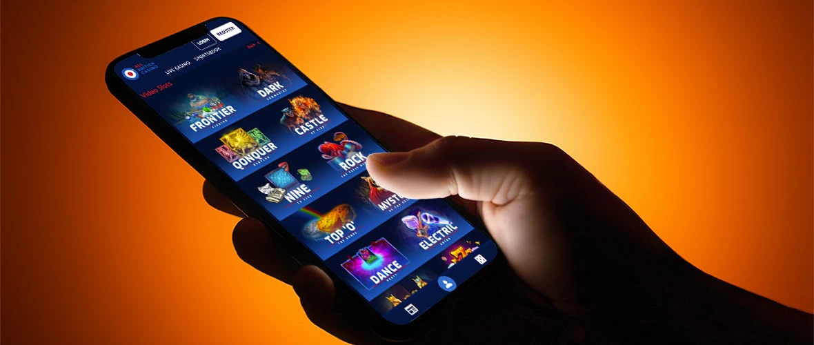 The All British Casino lobby viewed on iPhone 15 — note the search bar placement and the provider filter.